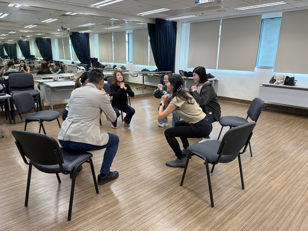 Participants engage in a hands-on practical tutorial during the Sports Health Empowerment Course.