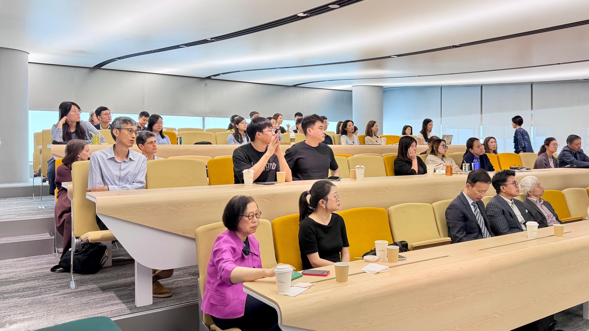 Professor Brown engages an attentive audience, providing a valuable opportunity for deeper discussion on the core themes of the lecture.